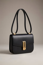 Obsidian Form | Structured Black Leather Shoulder Bag with Gold Clasp 0