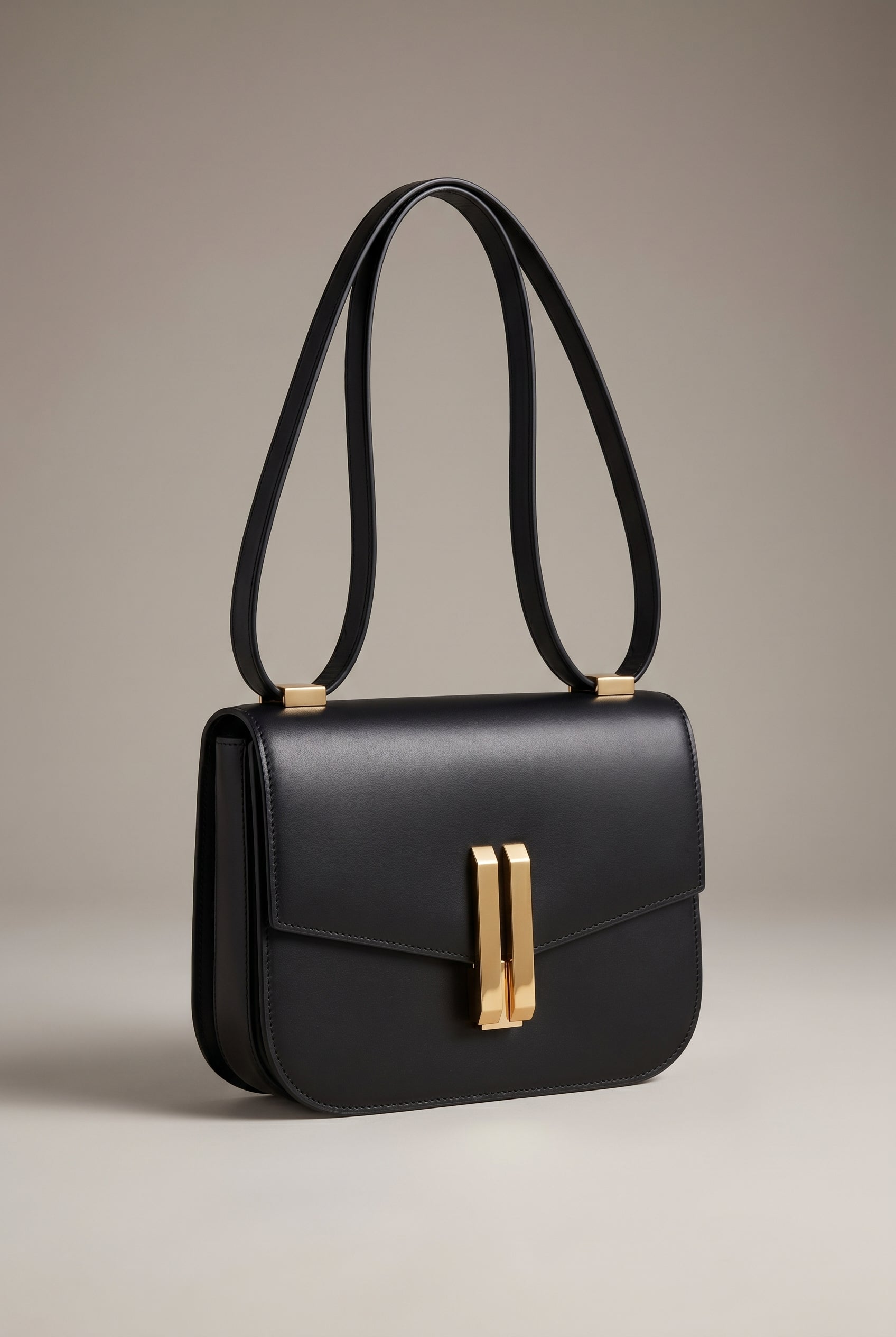 Obsidian Form | Structured Black Leather Shoulder Bag with Gold Clasp 0