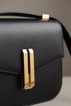 Obsidian Form | Structured Black Leather Shoulder Bag with Gold Clasp 1