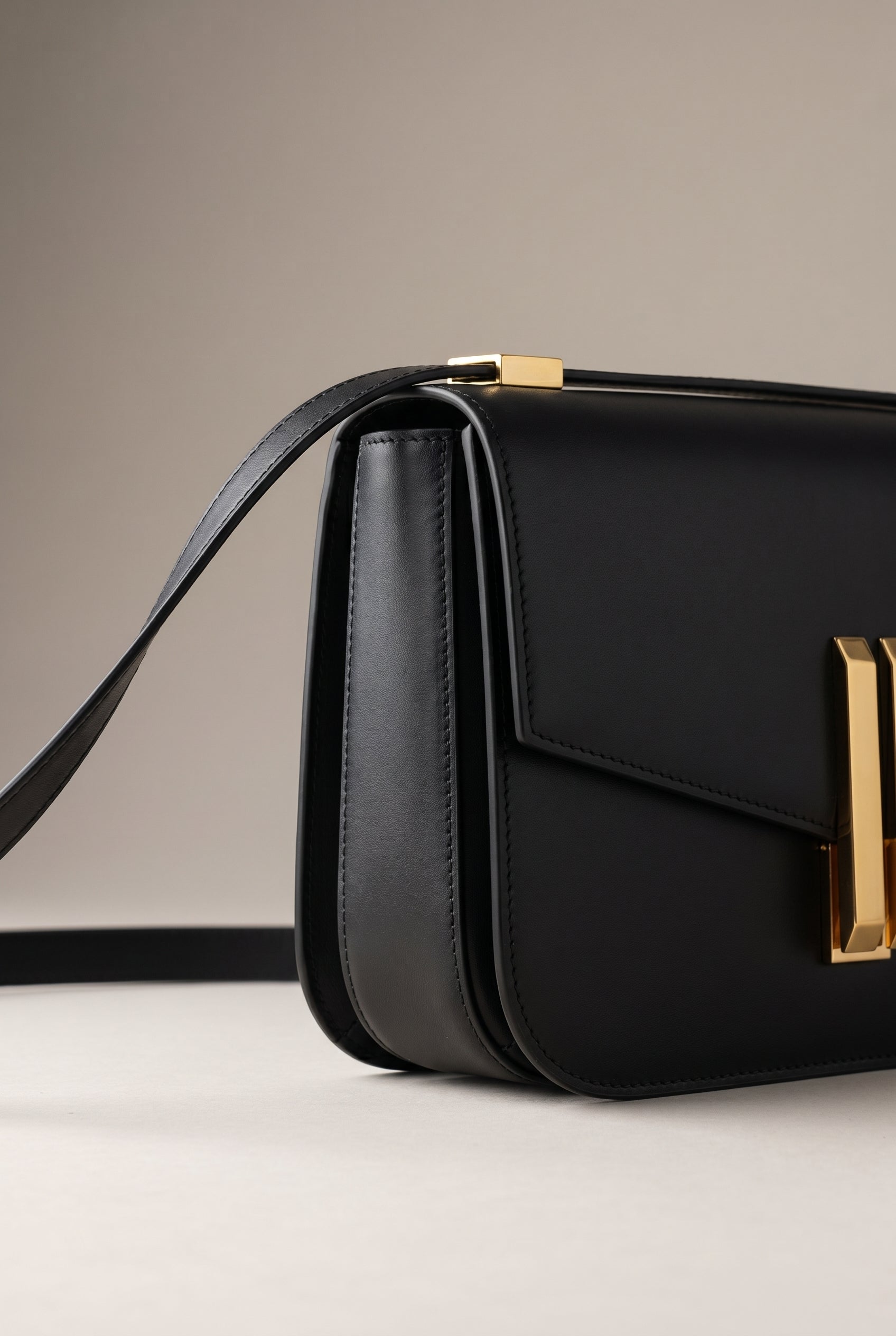 Obsidian Form | Structured Black Leather Shoulder Bag with Gold Clasp 2
