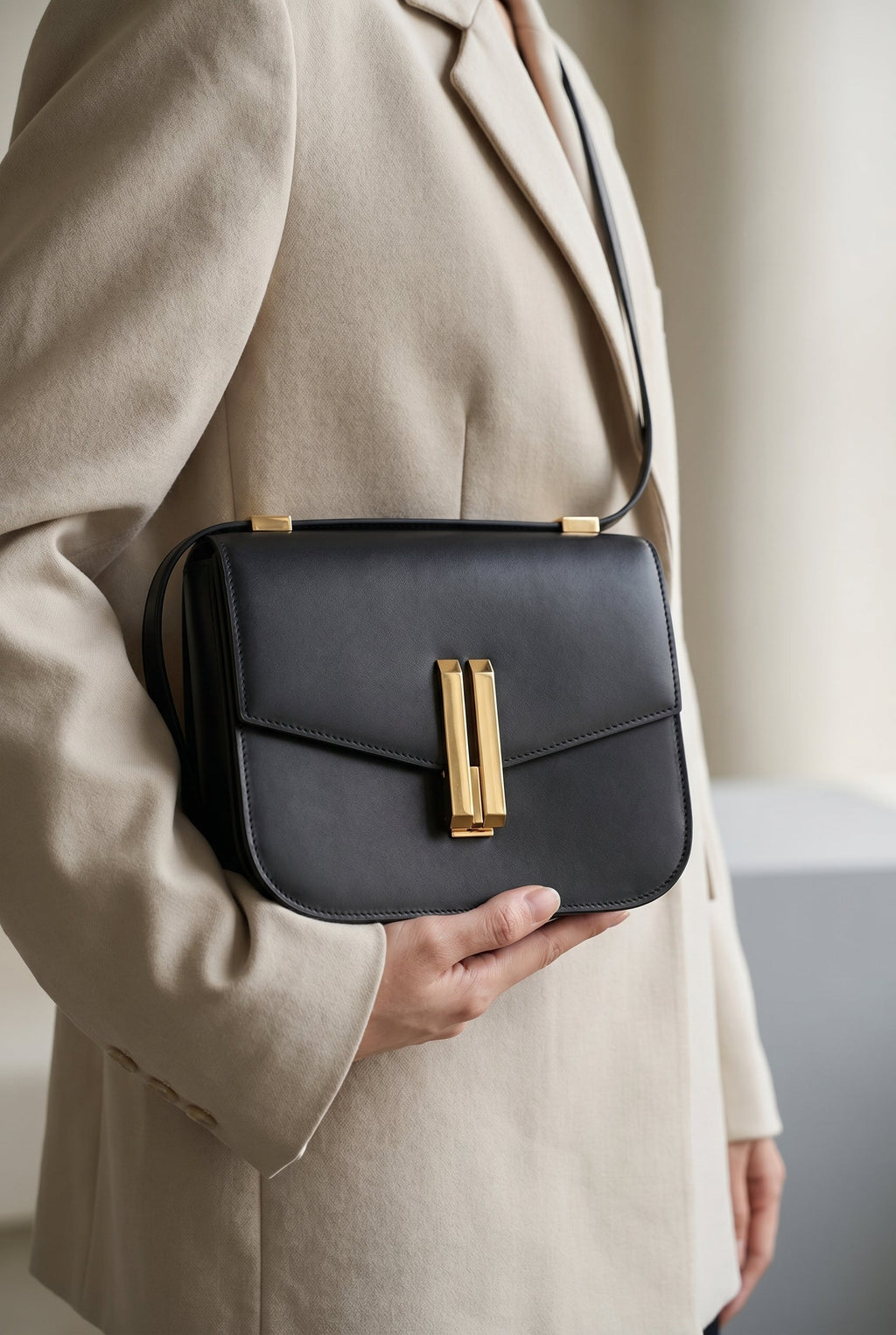 Obsidian Form | Structured Black Leather Shoulder Bag with Gold Clasp 4